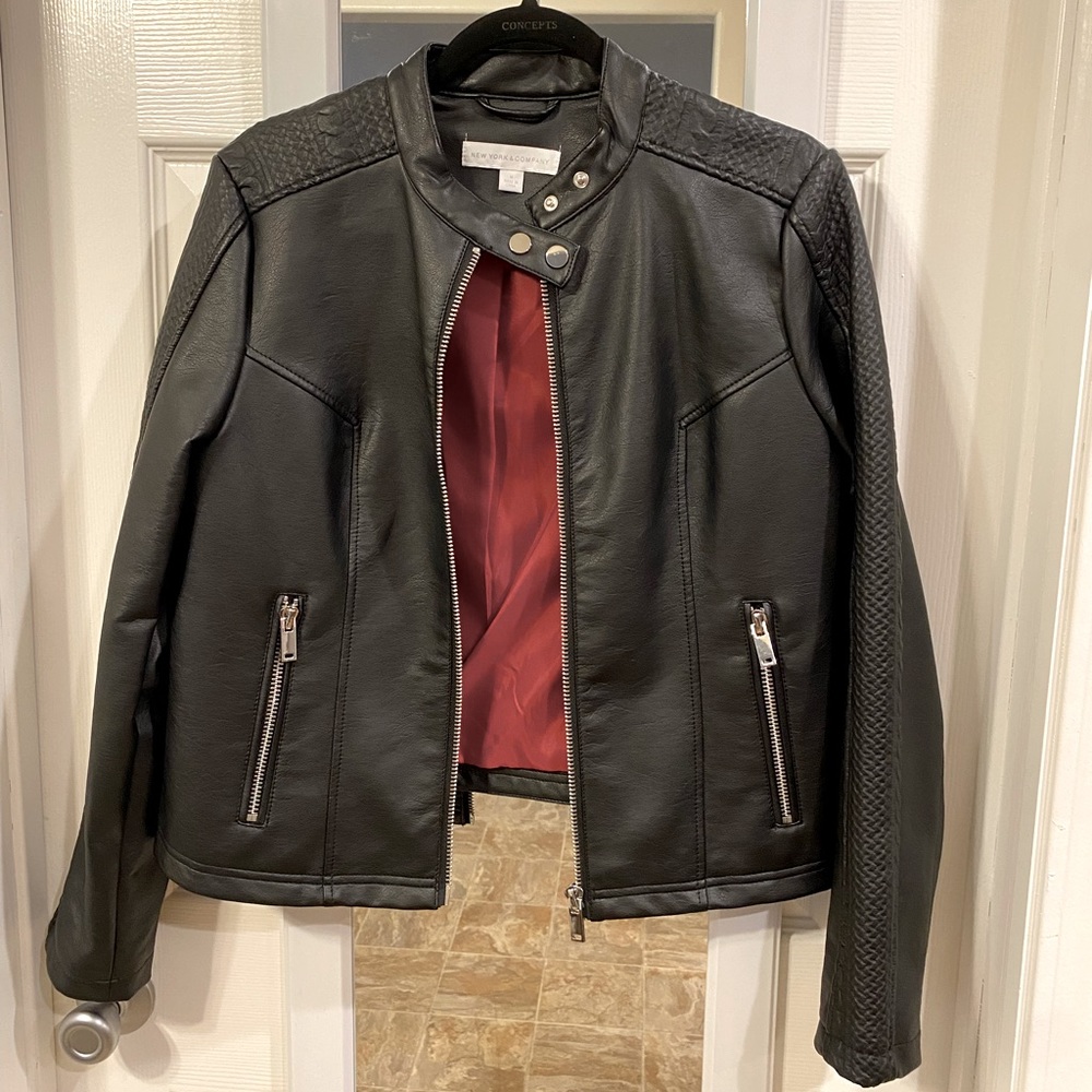 Like new. Never worn. Leather Jacket